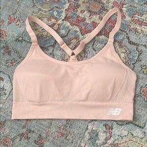 New Balance Women's pale peach Sports Bra szL